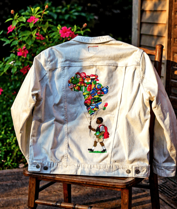 BALLOON BOY, by THE NYGERIANS, digitally printed on DENIM products: throw pillows, aprons, table place mats, and hand - made Unisex Denim Jackets in 3 color choices custom denim jacket by DenimINK