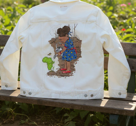 GIRL WATERING, by THE NYGERIANS, digitally printed on DENIM products: throw pillows, aprons, table place mats, and hand-made Unisex Denim Jackets in 3 color choices