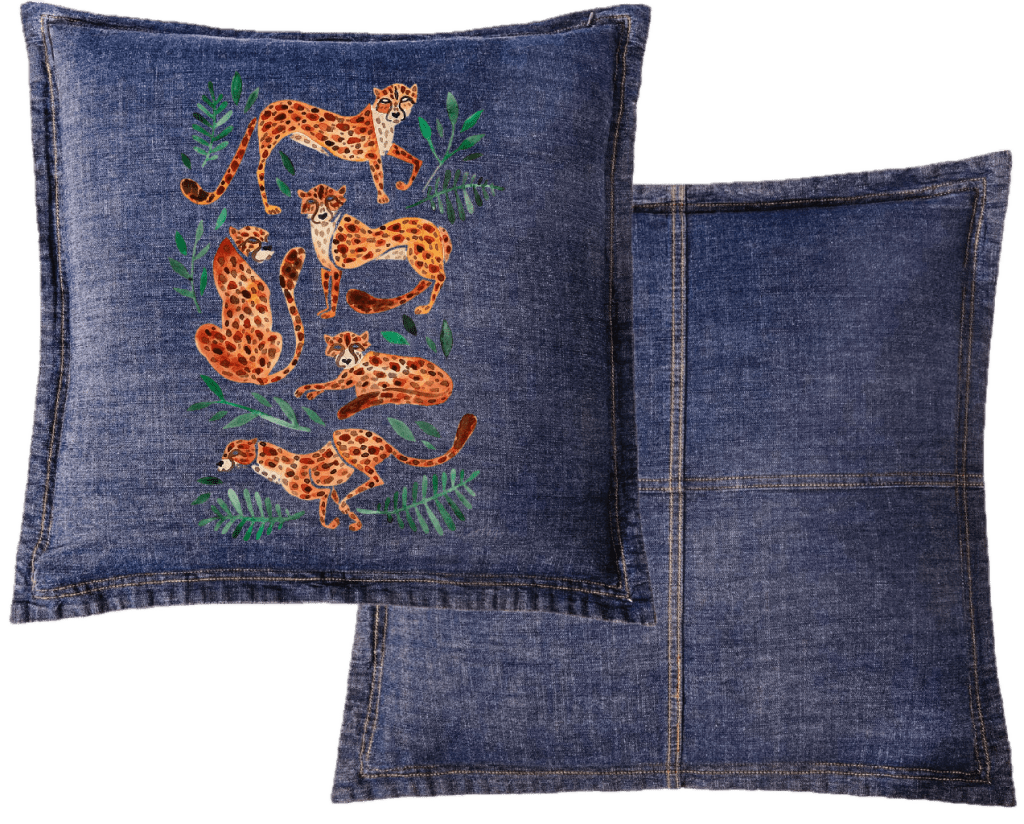 Denim pillow with embroidered leopards and leaves on a white background. cheetah-Collection-by-CatCoq-throw-pillow-WIDE-mockup