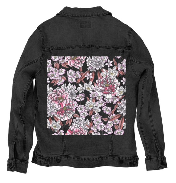 back view of a black denim jacket featuring a bold printed panel of hand-drawn peonies, layered blossoms & elongated rose leaves in a soft pink & cream palette with graphite outlines. the artwork “Pink Afternoon” by Cecilia Battaini is digitally printed on the jacket’s back panel by DenimINK.