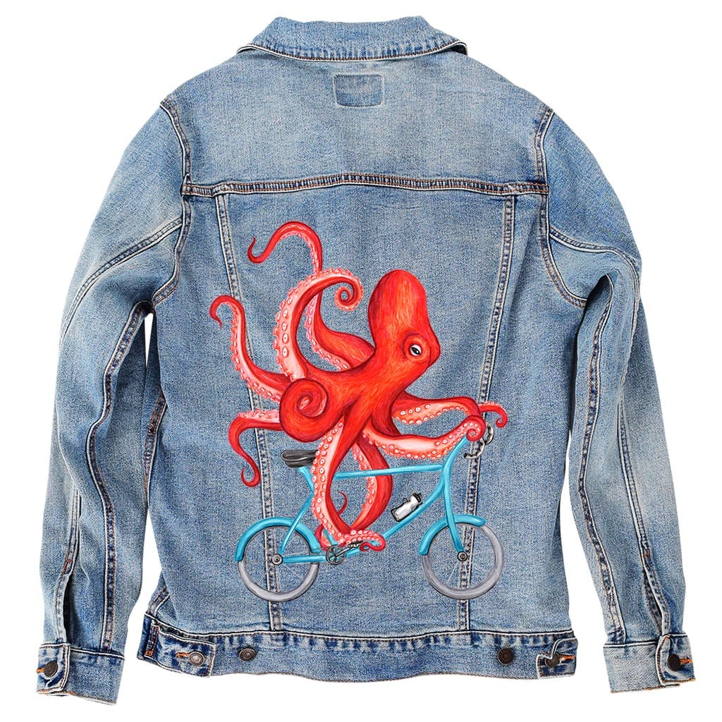 OCTOPUS RIDING A BICYCLE by AMELIA LEGAULT, digitally printed on DENIM products: throw pillows, aprons, table place mats, and hand-made Unisex Denim Jackets in 3 color choices OCTOPUS RIDING A BICYCLE by AMELIA LEGAULT, digitally printed on DENIM products: throw pillows, aprons, table place mats, and hand-made Unisex Denim Jackets in 3 color choices