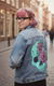 Blue Floral Skull by Jess Adams, printed on a hand-made Unisex Denim Jacket