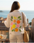 CITRUS BLOOM by HEND SHEHATA, digitally printed on a hand-made Unisex Denim Jacket