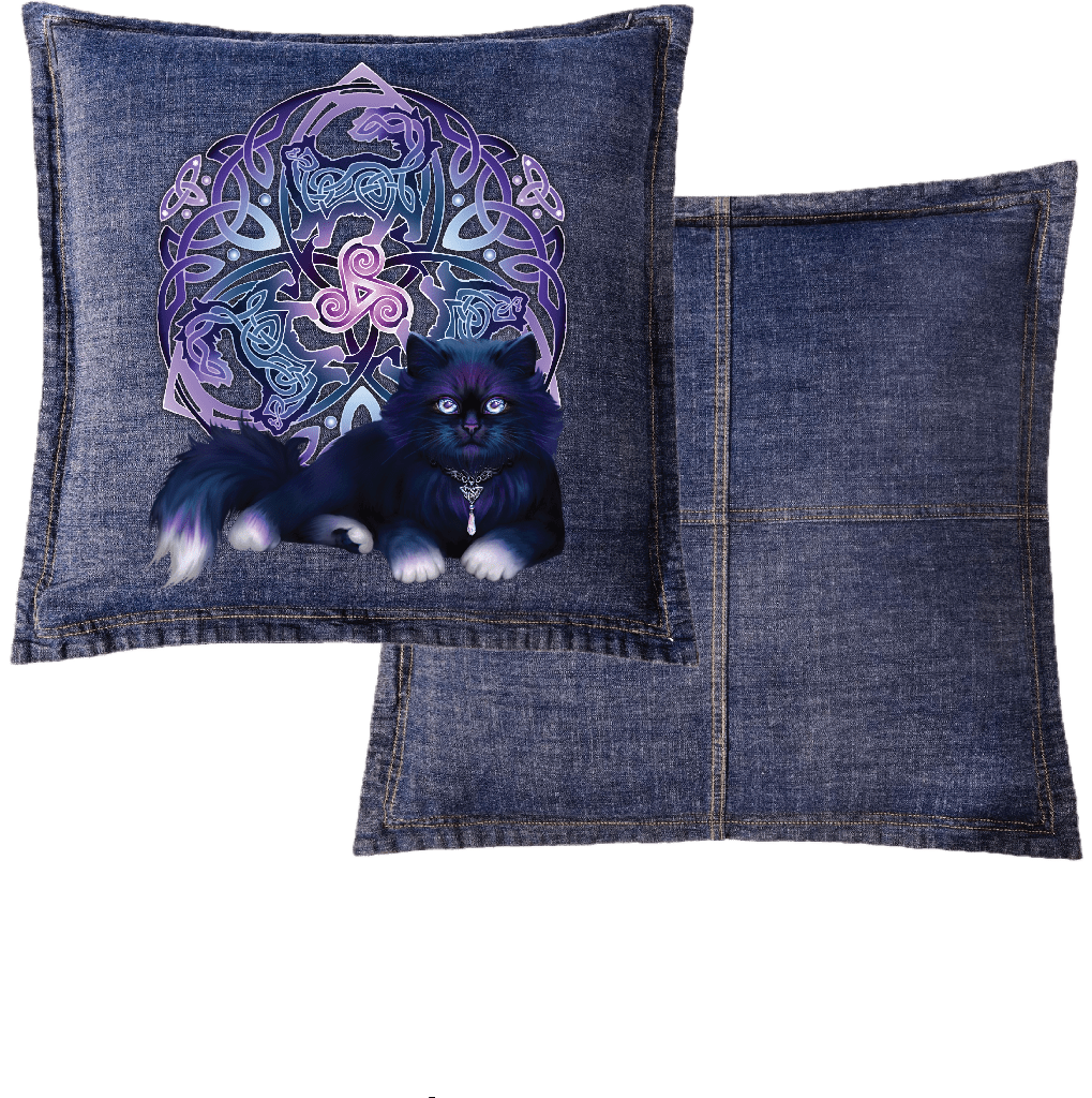 front and back view of a blue denim throw pillow featuring the artwork “Celtic Black Fluffy Cat” by Brigid Ashwood, printed centered on the front panel. the design shows a fluffy black cat with violet-blue highlights resting in front of a glowing Celtic knotwork emblem and triskelion in purple tones. contrast stitching and visible denim seams frame the artwork, with a plain blue denim back panel. digitally printed by DenimINK.