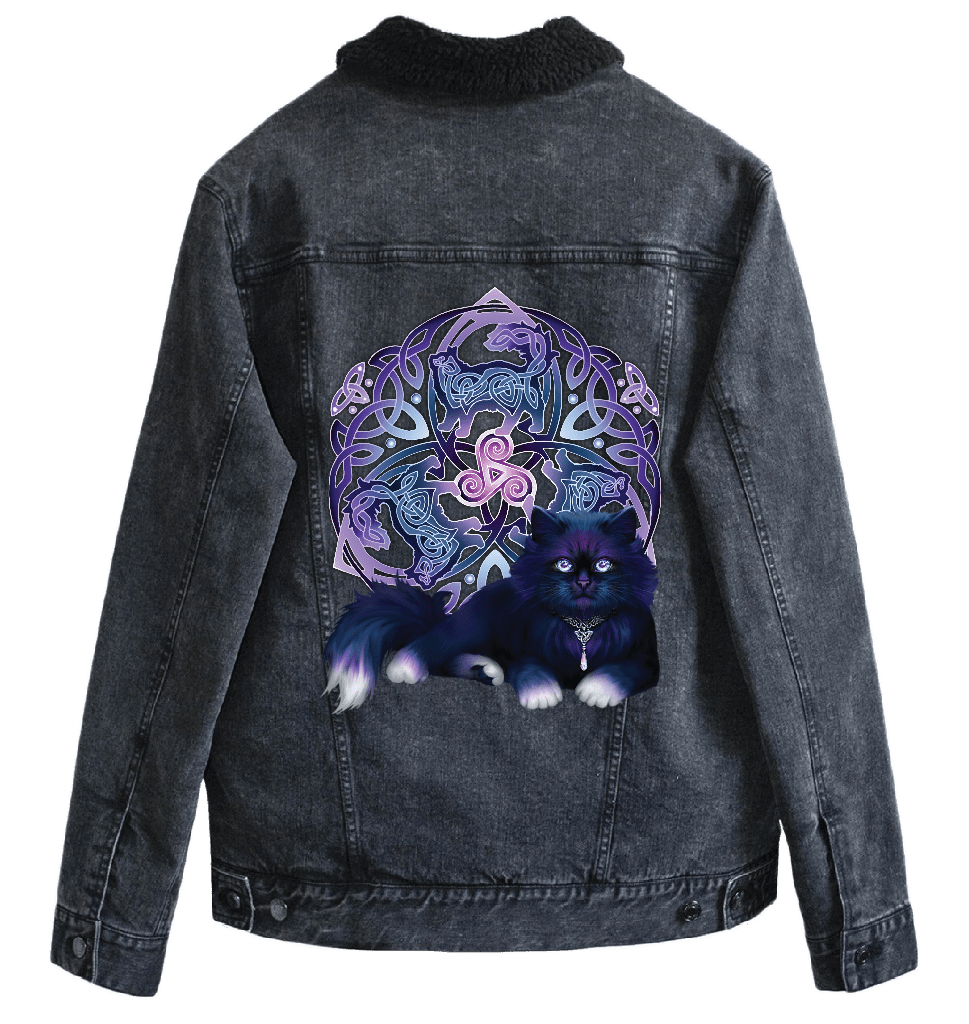 back view of a black denim jacket with a black sherpa-style liner featuring the artwork “Celtic Black Fluffy Cat” by Brigid Ashwood, printed centered on the back panel. the design shows a fluffy black cat with violet-blue highlights resting in front of a glowing Celtic knotwork emblem and triskelion in purple tones. the luminous artwork contrasts clearly against the dark denim. digitally printed by DenimINK.