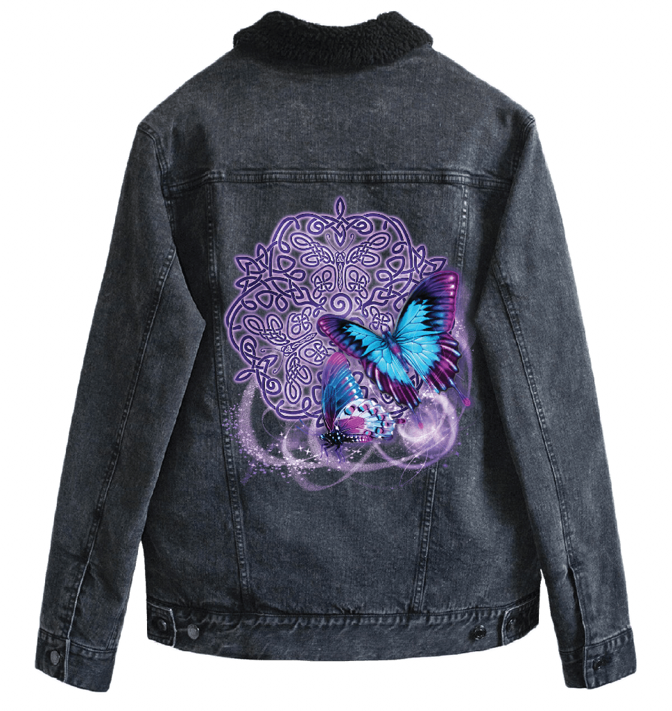 back view of a black denim jacket with a black sherpa-style liner featuring the artwork “Celtic Butterfly” by Brigid Ashwood, printed centered on the back panel. the design shows two luminous blue and purple butterflies in flight over an intricate Celtic knotwork motif with soft glowing accents. the vibrant colors contrast clearly against the dark denim. digitally printed by DenimINK.