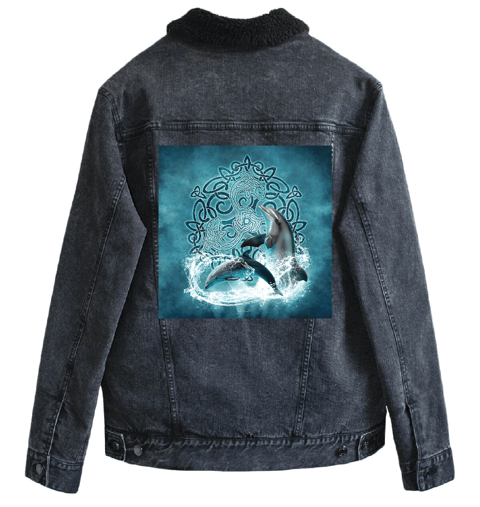 back view of a black denim jacket featuring the artwork “celtic dolphin” by brigid ashwood, printed centered on the back panel. the artwork depicts two realistic dolphins emerging through splashing water in front of an intricate teal and turquoise celtic knotwork circle set against a softly glowing aqua background. the jacket includes a black sherpa-style liner visible at the collar. digitally printed by DenimINK.