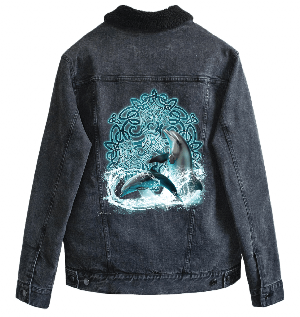 back view of a black denim jacket with a black sherpa-style liner featuring the artwork “Celtic Dolphin” by Brigid Ashwood, printed centered on the back panel. the design shows two dolphins leaping through splashing water in front of a glowing turquoise Celtic knotwork motif. the luminous aquatic colors contrast clearly against the dark denim. digitally printed by DenimINK.