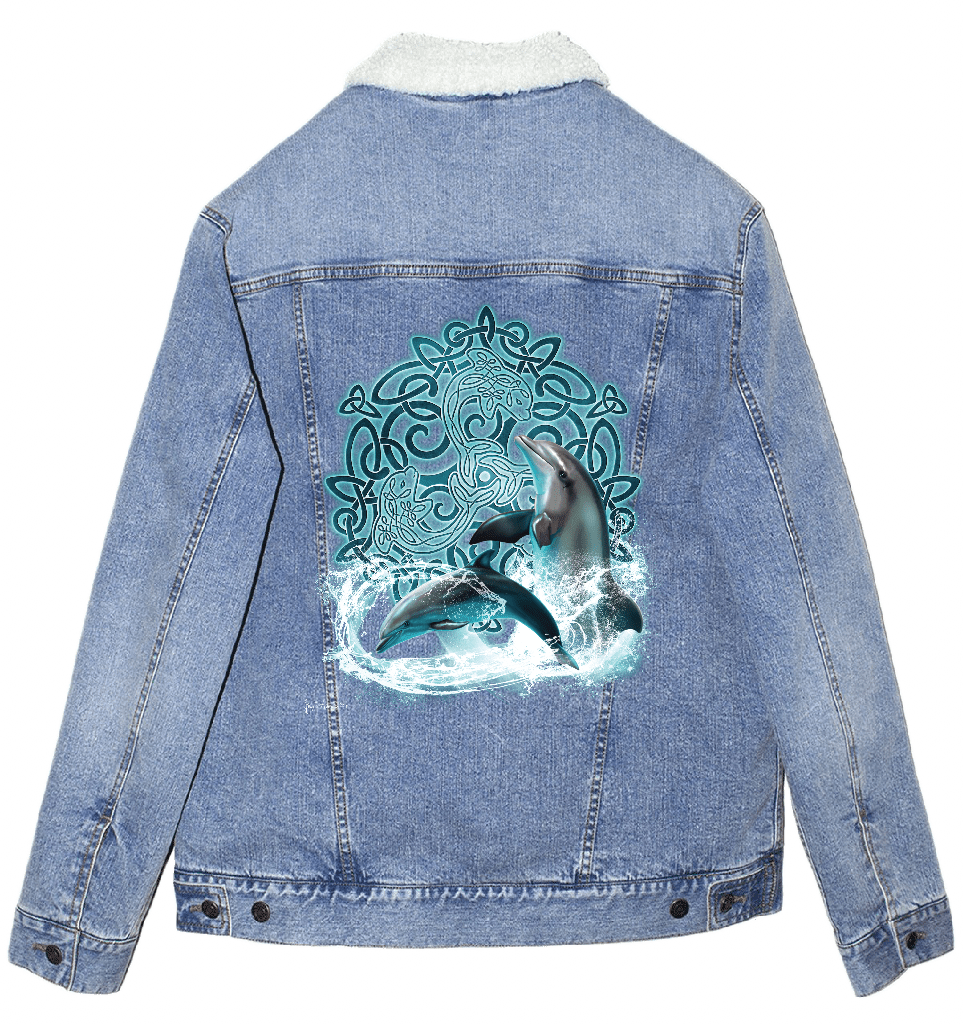 back view of a stonewash blue denim jacket with an off-white sherpa-style liner featuring the artwork “Celtic Dolphin” by Brigid Ashwood, printed centered on the back panel. the design shows two dolphins leaping through splashing water in front of a glowing turquoise Celtic knotwork motif. the luminous aquatic colors contrast clearly against the faded stonewash denim. digitally printed by DenimINK.