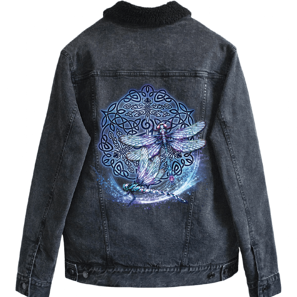 back view of a black denim jacket featuring the artwork “celtic dragon” by brigid ashwood, printed centered on the back panel. the artwork shows a seated dragon with green, teal, and purple scales positioned in front of an intricate circular celtic knotwork design in deep green and red tones, standing out clearly against the dark denim. the jacket includes a black sherpa-style liner visible at the collar. digitally printed by DenimINK.