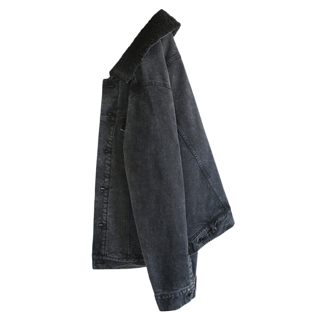 left side-view of a plain black denim jacket with black liner; showing seams, button holes, liner, and fit with no artwork printed