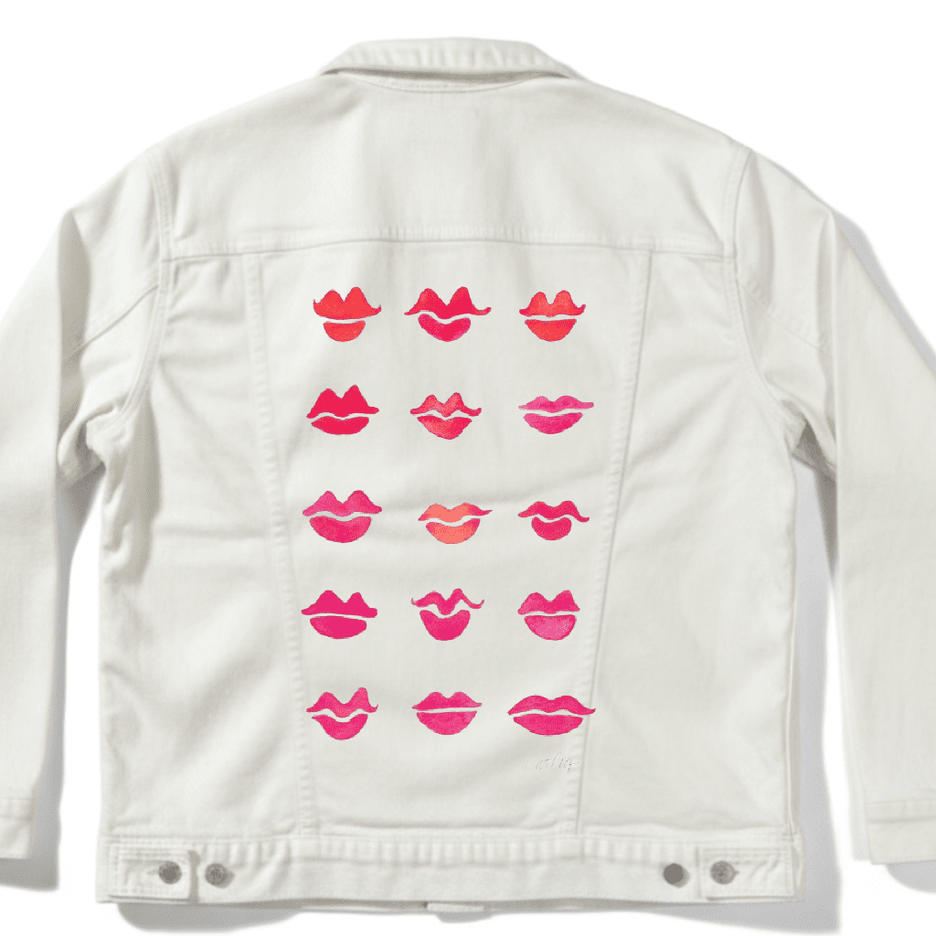 White jacket with pink lip prints on a white background. Kiss-Collection-by-CatCoq-denim_jacket_white-mockup