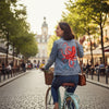 Octopus Riding a Bicycle by Amelie Legault, printed on a hand-made Unisex Denim Jacket