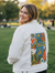 PEACE AND LOVE GREEN by KITSCH AND CURATE, digitally printed on a hand-made Unisex Denim Jacket