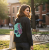 Blue Floral Skull by Jess Adams, printed on a hand-made Unisex Denim Jacket