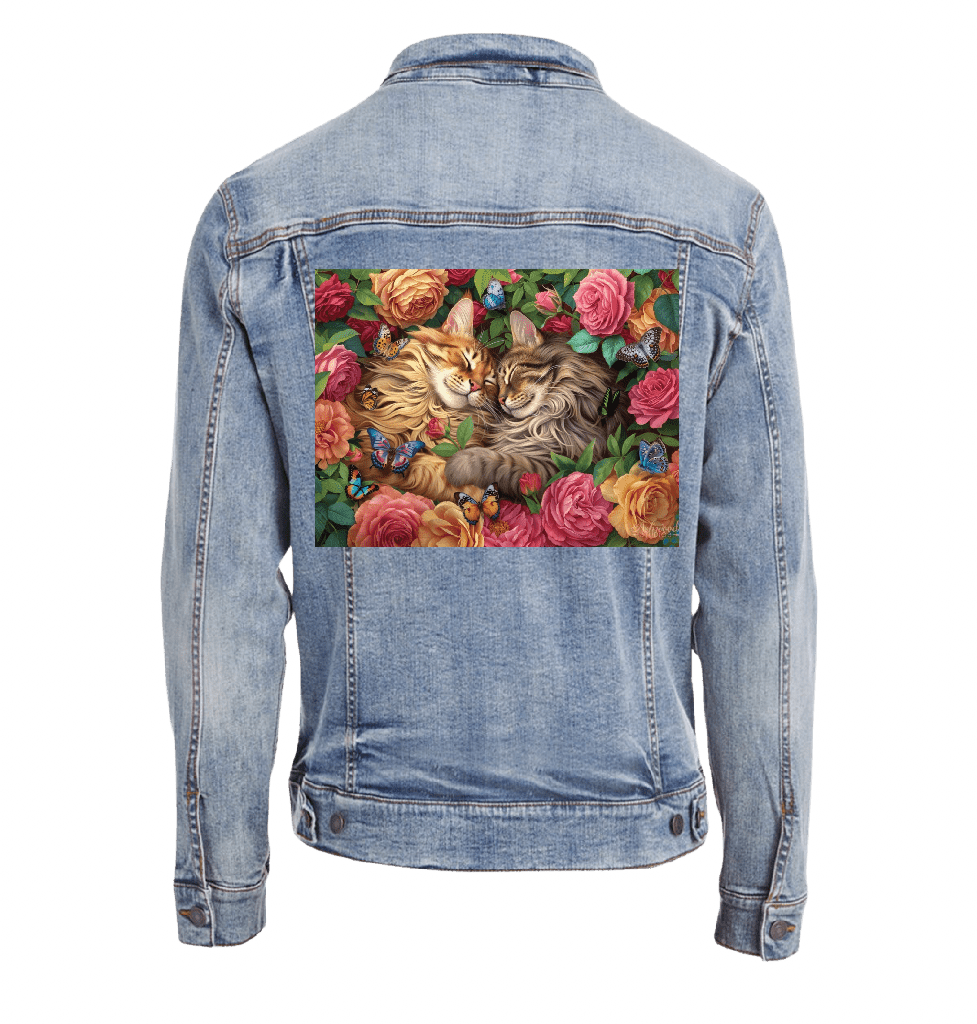 back view of a stonewash blue denim jacket featuring the artwork “Cats in Love” by Brigid Ashwood, printed centered on the back panel. the artwork depicts two long-haired cats resting cheek to cheek, surrounded by roses, green foliage, and small colorful butterflies. the warm floral tones contrast softly against the faded stonewash denim. digitally printed by DenimINK.