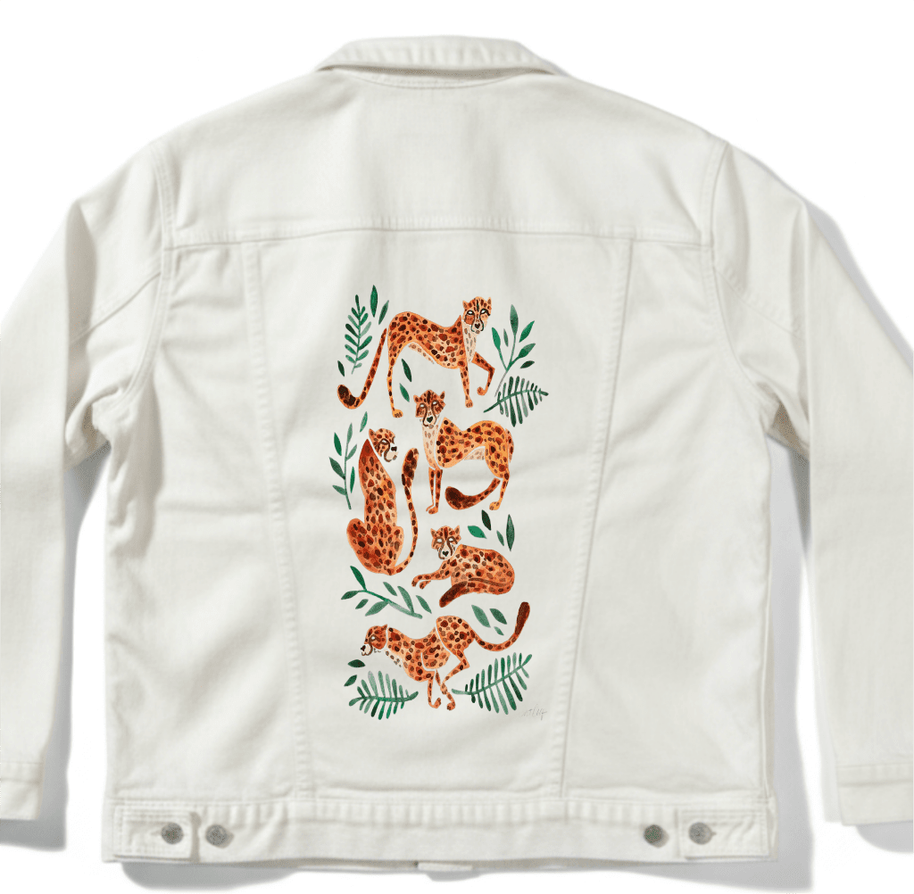 White jacket with orange cheetah design on a white background. cheetah-Collection-by-CatCoq-denim_jacket_white-mockup