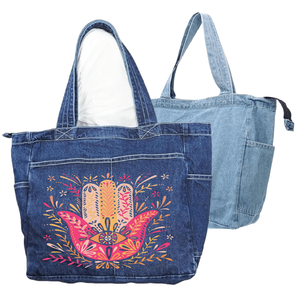 Denim tote bag with colorful hamsa hand design on a white background.  hamsa-hand-catcoq-tote_bag-WIDE-mockup