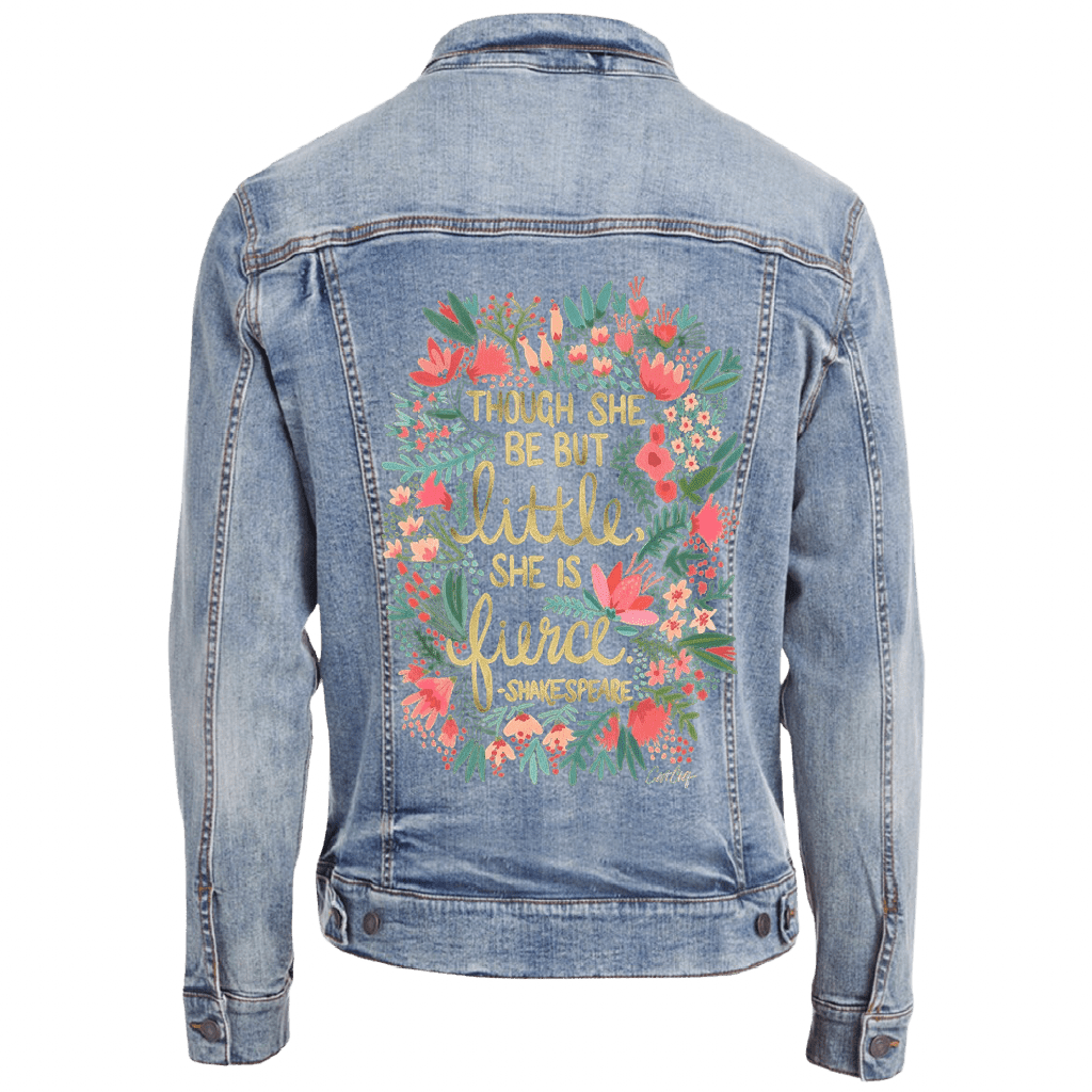 stonewashed Denim jacket with floral pattern . with Shakespears quote "Though She Be But Little, She is Fierce" printed by DenimINK.   Little and Fierce by CatCoq  mockup.