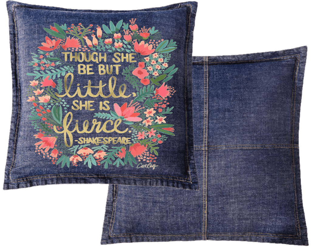 Denim pillow with floral design and with Shakespears quote "Though She Be But Little, She is Fierce" printed by DenimINK.   Little and Fierce by CatCoq on a denim throw pillow mockup.