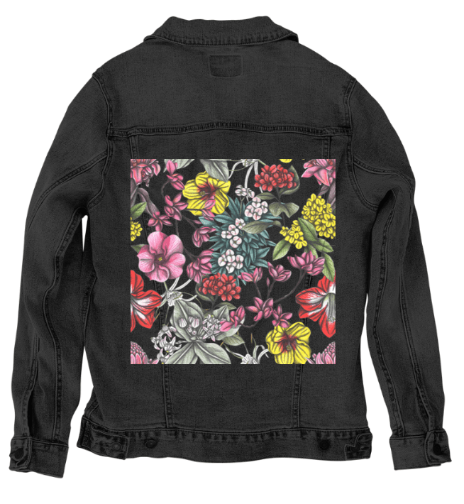 back view of a black denim jacket featuring a vivid floral design with lush, overlapping flowers in shades of crimson, gold, orchid, icy teal, &amp; cream. layered hand-drawn blooms evoke nighttime heat &amp; scent. the artwork “Night in India” by Cecilia Battaini is digitally printed on the jacket’s back panel by DenimINK.