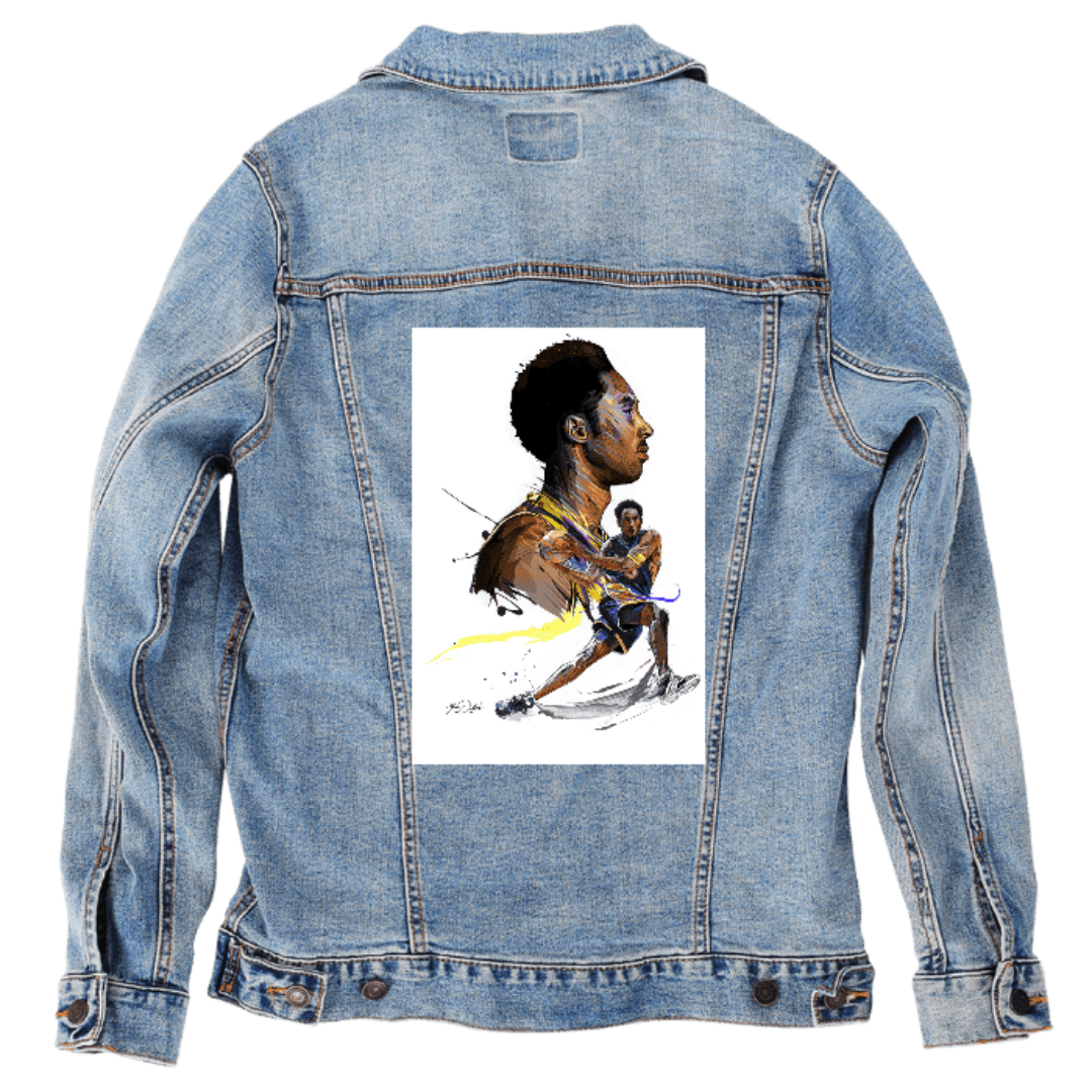 Customer designed custom denim jacket (L stonewash) featuring a dynamic illustrated artwork of a basketball player in two poses: a detailed side-profile portrait paired with an action pose of the player driving forward with energetic brush strokes of gold, purple, and black. The expressive, painterly style and bold motion lines create a dramatic athletic look that contrasts with the soft, faded blue denim, printed on denim jacket by DenimINK.