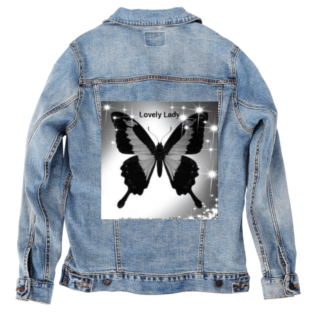 Customer designed custom denim jacket (XL stonewash) featuring a dramatic black-and-white butterfly printed on the back, its wings spread wide with sculpted edges and soft gradient shading. Above the butterfly, the words “Lovely Lady” appear in simple black lettering. Bright star-like sparkles burst across the image, creating a glowing, ethereal frame around the wings. The soft vignette background and shimmering highlights create a dreamy, elegant contrast against the rugged stonewash denim, printed on deni